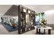 Elegant lobby with a bookshelf and seating area at 5701 Bowen Daniel Dr. # 1505, Tampa, FL 33616