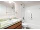 Bathroom with a single vanity, toilet, and shower/tub combination at 2222 Greenhaven Dr, Sun City Center, FL 33573