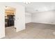 Open-concept living area flows into the kitchen with modern appliances at 2222 Greenhaven Dr, Sun City Center, FL 33573