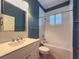 Simple bathroom with white vanity, tub, and shower at 4977 Sapphire Sound Dr, Wimauma, FL 33598