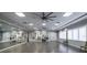 Well-equipped exercise room featuring ample natural light and storage at 4977 Sapphire Sound Dr, Wimauma, FL 33598
