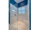 Large walk-in shower with built-in seat at 4977 Sapphire Sound Dr, Wimauma, FL 33598