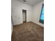 Bedroom with carpet, closet, and window at 11883 Brighton Knoll Loop, Riverview, FL 33579