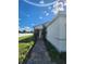 House exterior with walkway, landscaping, and red front door at 11883 Brighton Knoll Loop, Riverview, FL 33579