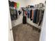 Walk-in closet with ample hanging and shelving space at 11883 Brighton Knoll Loop, Riverview, FL 33579
