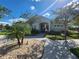 Community center with gated entrance and landscaping at 11883 Brighton Knoll Loop, Riverview, FL 33579