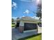 Community mailbox area with numerous mailboxes in a covered structure at 11883 Brighton Knoll Loop, Riverview, FL 33579