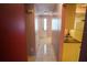 Hallway with a front door entrance and view to the kitchen space at 1601 43Rd S N St # 224, St Petersburg, FL 33713