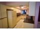 A full view of the kitchen with tile floor and vintage cabinets at 1601 43Rd S N St # 224, St Petersburg, FL 33713