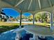 Gazebo with seating overlooking pool area at 8651 10Th N St # 118, St Petersburg, FL 33702