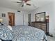 Spacious bedroom with dresser and ensuite bathroom access at 8651 10Th N St # 118, St Petersburg, FL 33702