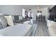 Living and dining area with gray sofa and dining set at 8651 10Th N St # 118, St Petersburg, FL 33702