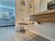 Bright vanity area with chair and view into bedroom at 8651 10Th N St # 118, St Petersburg, FL 33702
