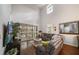 Spacious living room with hardwood floors, high ceilings and sliding glass doors leading to a patio at 2539 Silverback Ct, Palm Harbor, FL 34684