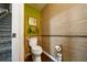 Stylish bathroom with bamboo accents and a modern toilet at 2539 Silverback Ct, Palm Harbor, FL 34684