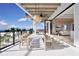 Relaxing balcony boasts outdoor seating and ocean views at 10126 Gulf Blvd # Ph2, Treasure Island, FL 33706