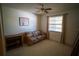 Bedroom with neutral walls, carpet, and a sofa at 1601 43Rd S N St # 224, St Petersburg, FL 33713