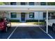 Condo building entrance with carport parking at 1601 43Rd S N St # 224, St Petersburg, FL 33713