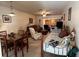 Dining area with table and chairs, open to the living room and bedroom at 1465 Normandy Park Dr # 3, Clearwater, FL 33756