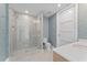 Stylish bathroom with a glass shower and patterned tile at 3401 Bayshore Blvd # 1801, Tampa, FL 33629
