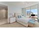 Comfortable bedroom with ensuite bathroom and balcony access at 3401 Bayshore Blvd # 1801, Tampa, FL 33629