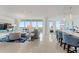 Spacious living room with water views, modern furniture, and open floor plan at 3401 Bayshore Blvd # 1801, Tampa, FL 33629