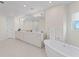 Bathroom boasts a large soaking tub and double vanity at 3401 Bayshore Blvd # 1801, Tampa, FL 33629