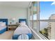 Bedroom with twin beds, water view, and ample natural light at 3401 Bayshore Blvd # 1801, Tampa, FL 33629