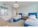 Bright bedroom with twin beds, a large window, and modern decor at 3401 Bayshore Blvd # 1801, Tampa, FL 33629