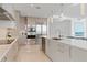 Modern kitchen with stainless steel appliances and custom cabinetry at 3401 Bayshore Blvd # 1801, Tampa, FL 33629