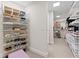 Spacious walk-in closet with ample shelving and drawers at 3401 Bayshore Blvd # 1801, Tampa, FL 33629