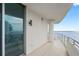 Long balcony with glass doors and panoramic water views at 3401 Bayshore Blvd # 1801, Tampa, FL 33629