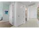 Bright hallway with access to multiple rooms and a bathroom at 3401 Bayshore Blvd # 1801, Tampa, FL 33629