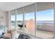 Living room with floor-to-ceiling windows offering stunning water views at 3401 Bayshore Blvd # 1801, Tampa, FL 33629