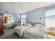 Bedroom with mirrored closet and two twin beds at 36750 Kimela Ave, Zephyrhills, FL 33542