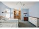 Bedroom with two twin beds and en-suite bathroom at 36750 Kimela Ave, Zephyrhills, FL 33542