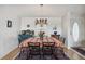 Bright dining room with a table, chairs, and chandelier at 36750 Kimela Ave, Zephyrhills, FL 33542