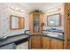 Bathroom with corner vanity and double sinks at 36750 Kimela Ave, Zephyrhills, FL 33542