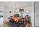 Spacious dining area with table, chairs, and buffet at 36750 Kimela Ave, Zephyrhills, FL 33542