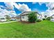 Mobile home with landscaped yard, and driveway at 36750 Kimela Ave, Zephyrhills, FL 33542