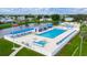 Resort-style pool with ample lounge chairs and a hot tub at 36750 Kimela Ave, Zephyrhills, FL 33542