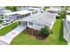 Aerial view of mobile home and surrounding neighborhood at 36750 Kimela Ave, Zephyrhills, FL 33542