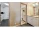 Bathroom with granite countertop, double vanity, and a shower/tub combo at 36750 Us Highway 19 N # 04308, Palm Harbor, FL 34684
