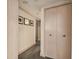 Hallway with neutral walls, carpet, and access to bedrooms and closets at 36750 Us Highway 19 N # 04308, Palm Harbor, FL 34684