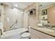 Updated bathroom with a shower/tub and granite vanity at 36750 Us Highway 19 N # 04308, Palm Harbor, FL 34684