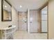 Bright entryway with tile flooring, mirror, and access to other rooms at 36750 Us Highway 19 N # 04308, Palm Harbor, FL 34684
