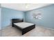 Simple bedroom with a double bed and window at 1249 Viking Dr, Holiday, FL 34691