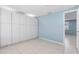 Large storage area with built-in white cabinets at 1249 Viking Dr, Holiday, FL 34691