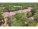 Aerial view shows community buildings and parking at 5608 Pinnacle Heights Cir # 305, Tampa, FL 33624