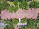 An aerial view featuring a building surrounded by lush greenery at 5608 Pinnacle Heights Cir # 305, Tampa, FL 33624